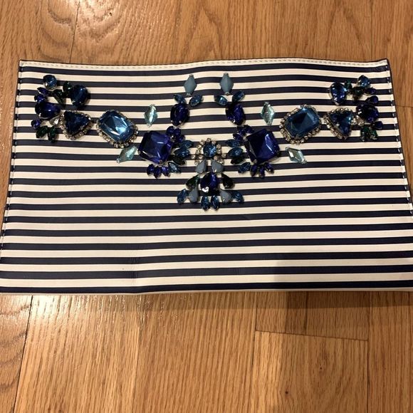 Express jeweled clutch with navy and white stripes